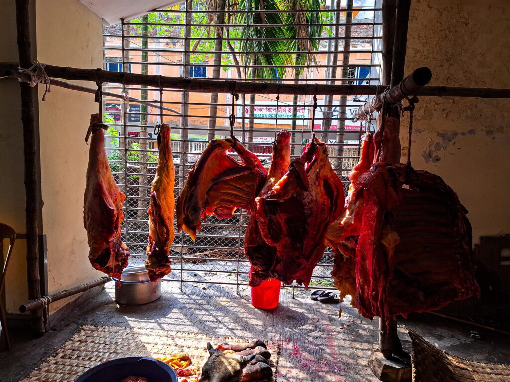 Fresh Qurbani meat ready to be shared with families in Bangladesh